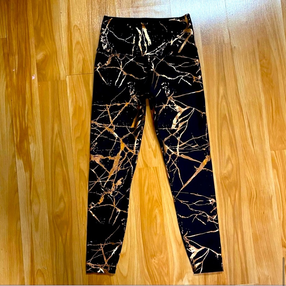 Beyond Yoga gold splatter high waisted black leggings
